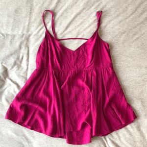 Flirty top with open back with zipper detail